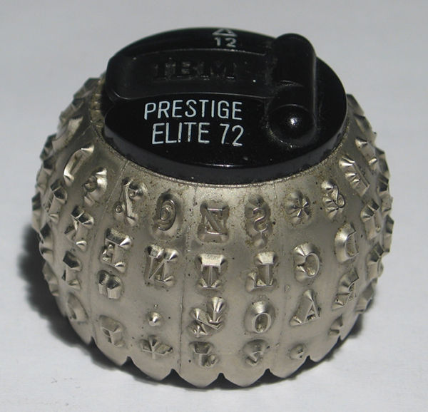A close-up of the Prestige Elite 72 IBM typeball.
